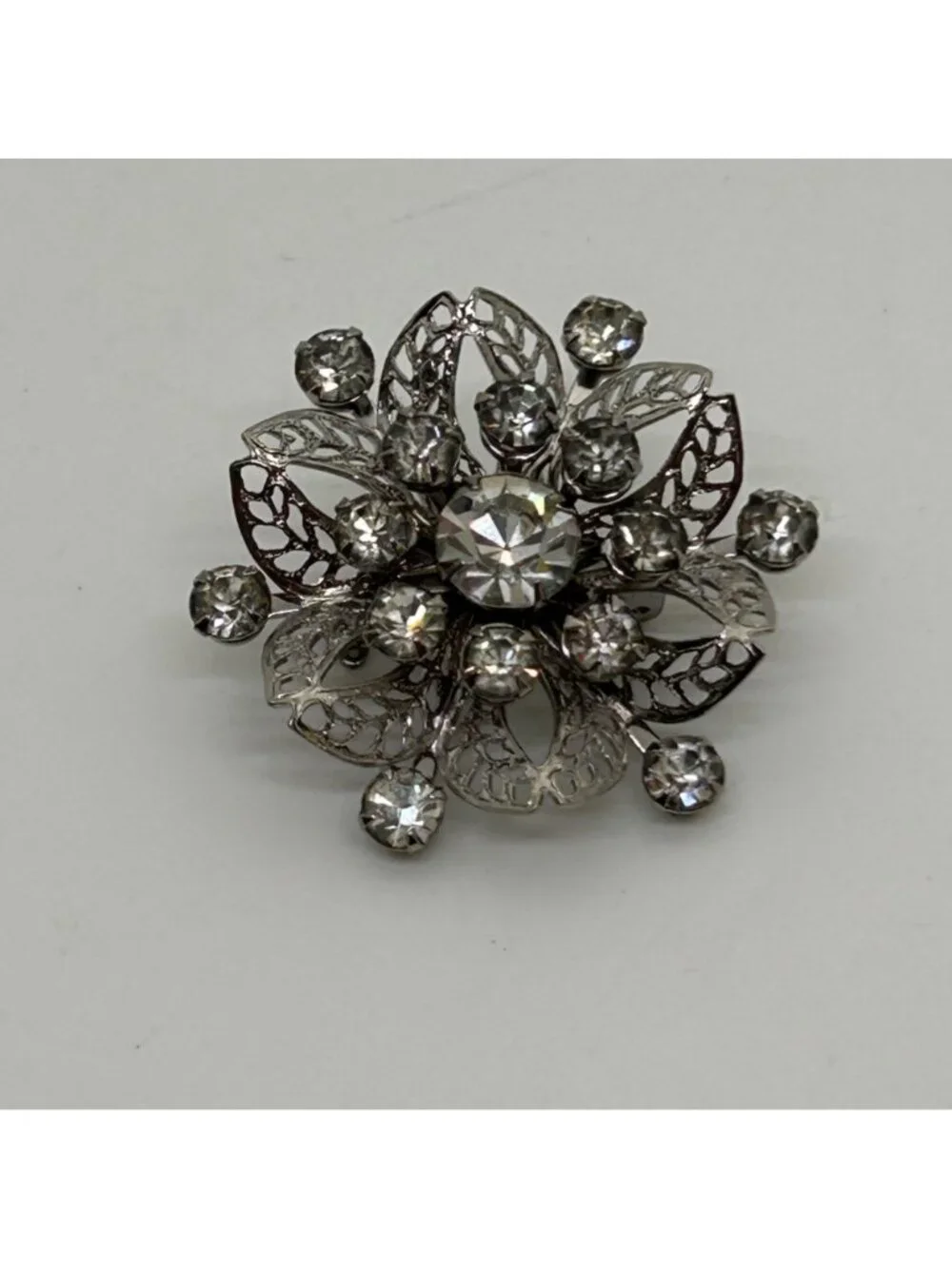 Vintage Silver Tone Rhinestone Brooch Pin Clear Crystal Floral Filigree Mid Cent